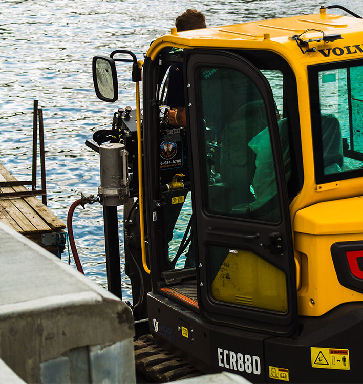 Water tight WORD Excavator Attachment drilling completely underwater